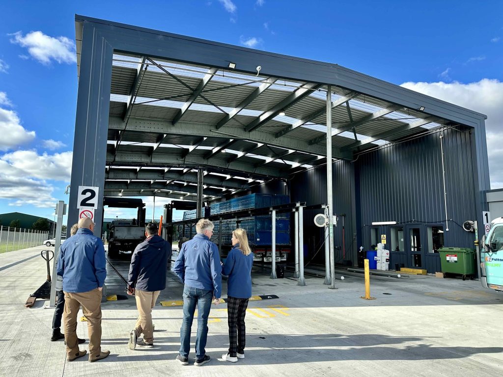 CleanCo,Managers,Watching,Truckwashing,At,Coffee,And,Clean,Palmerston,North,Site.